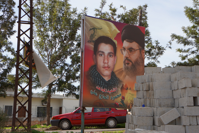 Portrait of the first martyr of Hojaliâs family with the leader of the resistance Hassan Nasrallah near his home (Photo by Nadezhda Kevorkova)