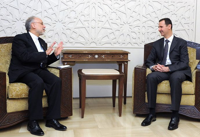 Syrian President Bashar al-Assad (right) meeting with Iranian Foreign Minister Ali Akbar Salehi on May 7, 2013 in the Syrian capital, Damascus. (AFP Photo / SANA)