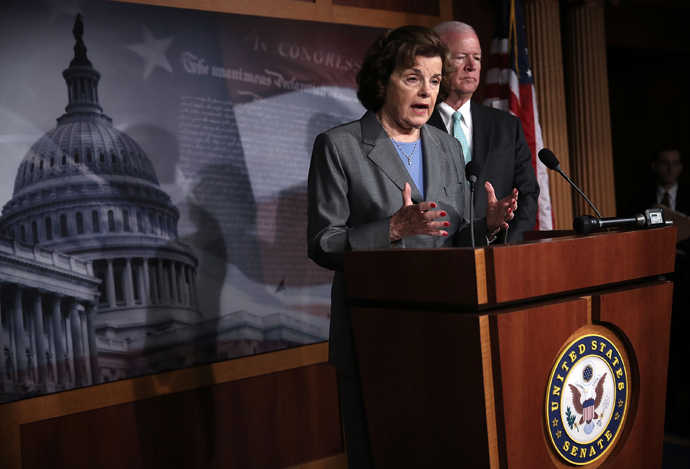 Chairman and Vice Chairman of the U.S. Senate Select Committee on Intelligence, Sen. Dianne Feinstein (D-CA) (L) and U.S. Sen. Saxby Chambliss (R-GA) (R), speak to members of the media about the National Security Agency (NSA) collevting phone records June 6, 2013 on Capitol Hill in Washington, DC (Alex Wong / Getty Images / AFP) 