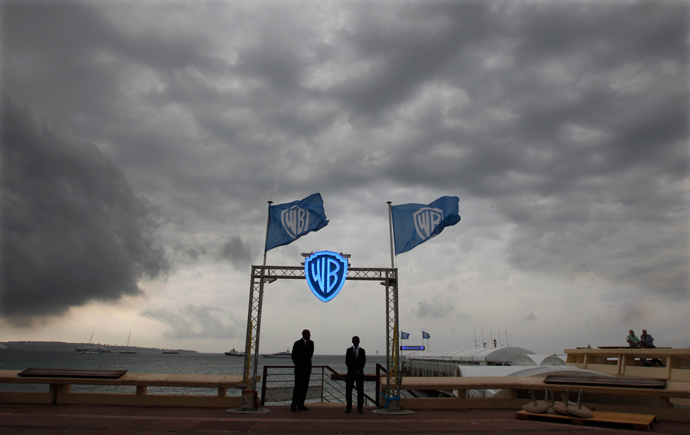 Security guards stand at the entrance of the Warner Bros beach (Reuters / Eric Gaillard)
