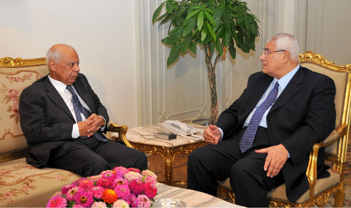  In this handout picture made available by the Egyptian presidency shows Egypt's interim president Adly Mansour (R) meeting with with new-appointed Prime Minister Hazem al-Beblawi, on July 9, 2013 in the Egyptian capital, Cairo (AFP Photo)