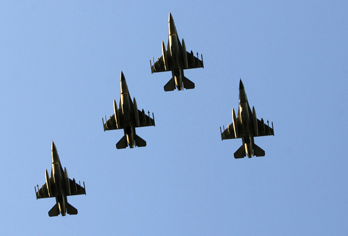 F-16 fighter jets (Reuters/Mike Blake)