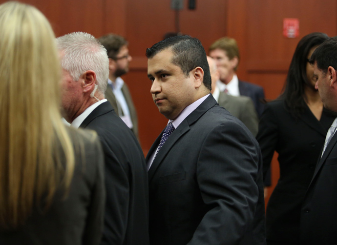 George Zimmerman leaves court with his family after the jury delivered a not guilty verdict in his trial for the 2012 shooting death of Trayvon Martin at the Seminole County Criminal Justice Center in Sanford, Florida, July 13, 2013 (Reuters / Gary W. Green / Pool) 