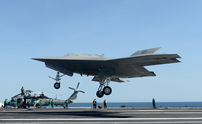 This photo released by the US Navy shows an X-47B unmanned combat air system (UCAS) demonstrator preparing to execute a touch and go landing on May 17, 2013 on the flight deck of the aircraft carrier USS George H.W. Bush (CVN 77)in the Atlantic Ocean. (AFP Photo/US Navy)