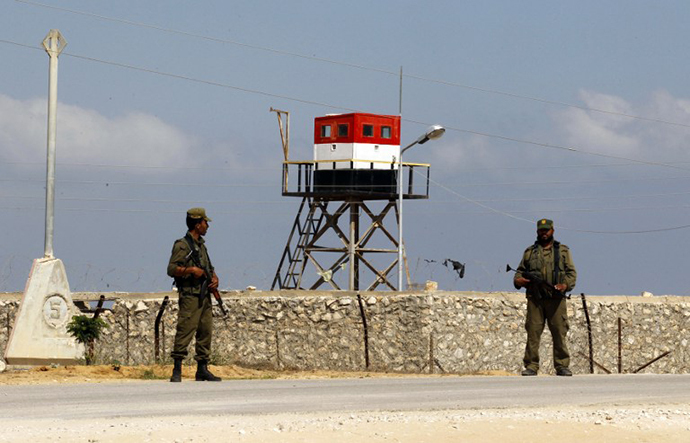 Palestinian Hamas security forces patrol near the border with Egypt in Rafah, southern Gaza Strip, on July 5, 2013. (AFP Photo / Said Khatib)