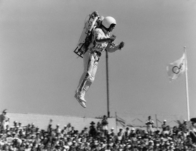 The jetman flies into the Olympic Coliseum at the start of the gala opening ceremony of the 1984 Summer Olympics, in Los Angeles, California, United States on July 28, 1984 (AFP Photo)