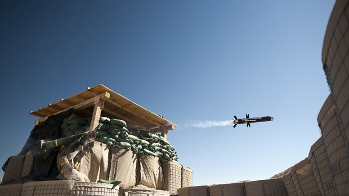 A US Marine from 1st Battalion, 8th Marines, Bravo company launches an FMG-148 Javelin anti-tank missile at Mirage patrol base, Musa Qala District, Helmand province on February 8, 2011. (AFP Photo / Dmitry Kostyukov)