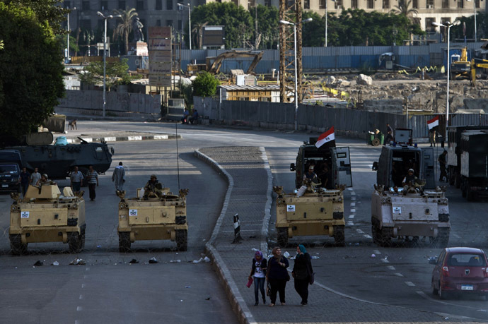 Egyptian army armoured personnel carriers (APC) are seen stationed in front of the Egyptian Museum in Tahrir Square on August 18, 2013 in Cairo. (AFP Photo)