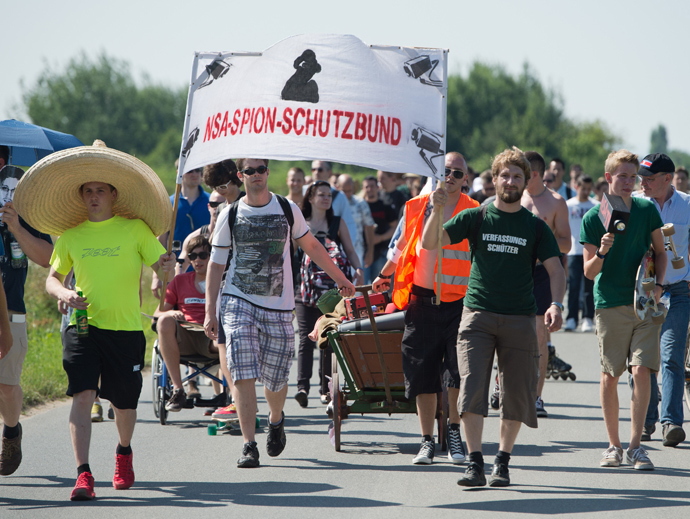 A few hundred people take part in a protest outside a US National Security Agency (NSA) listening station in Griesheim near Darmstadt, Germany (AFP Photo / DPA / Boris Roessler / Germany out) 