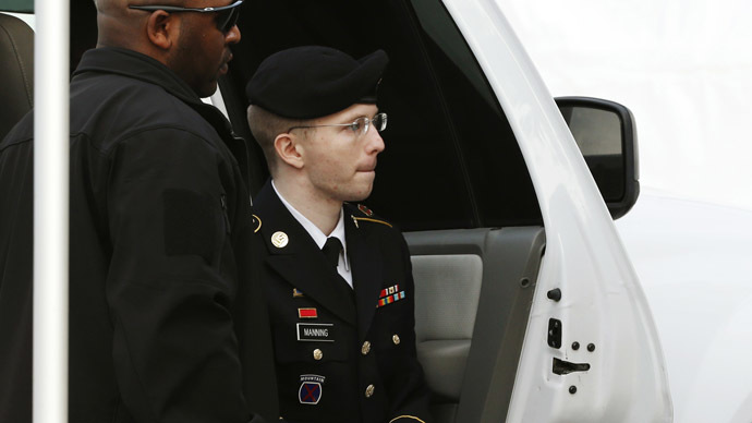 U.S. soldier Bradley Manning is escorted into court to receive his sentence at Fort Meade in Maryland August 21, 2013. (Reuters/Kevin Lamarque)