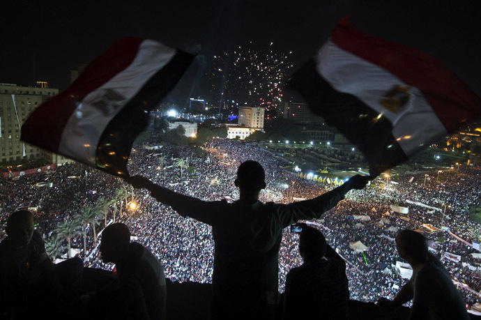 Supporters of Egyptian Armed Forces General Ahmed Fattah al-Sisi rally at Tahrir Square in Cairo on July 26, 2013. (AFP Photo)