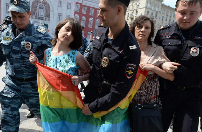 Police apprehend participants in an unauthorized rally held by gay activists next to the Yury Dolgoruky monument on Tverskaya Square in Moscow.(RIA Novosti / Alexey Filippov)