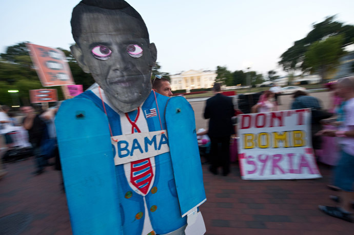 Anti-war demonstrators protest against US intervention in Syria in front of the White House in Washington on September 10, 2013 before US President Brack Obama addresses the nation on Syria. (AFP Photo/Nicholas Kamm)