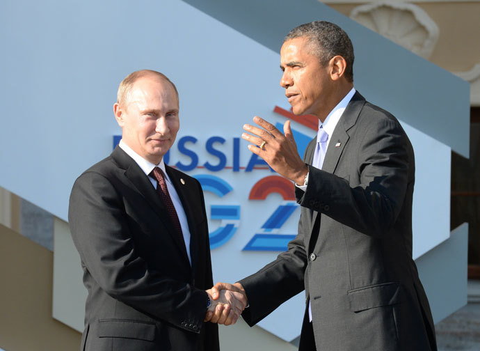 Russiaâs President Vladimir Putin (L) welcomes US President Barack Obama at the start of the G20 summit on September 5, 2013 in Saint Petersburg. (AFP Photo / Yuri Kadobnov)