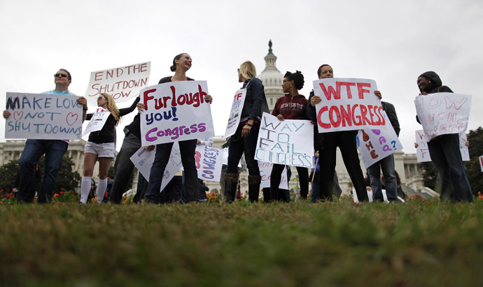 Federal workers demonstrate for an end to the U.S. government shutdown on the west front of the U.S. Capitol in Washington, October 13, 2013. (Reuters)