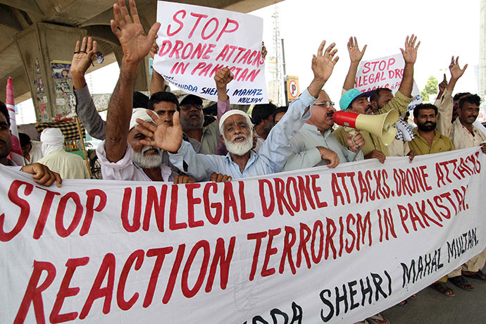 Pakistani protesters from the United Citizen Action shout slogans against US drone attacks in the Pakistani tribal areas during a protest in Multan on July 14, 2013. (AFP Photo / S.S. Mirza)