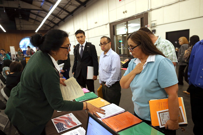 A job seeker meets with recruiters during the Job Hunters Boot Camp at the San Mateo Event Center in San Mateo, California. (Justin Sullivan/Getty Images/AFP)