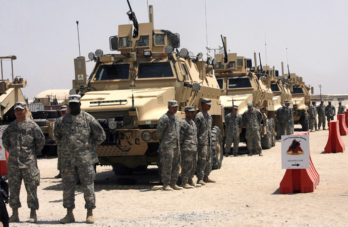 A US convoy of the 1st sustainment brigade prepares to go to Iraq to bring back heavy military equipment at an undisclosed US military base in Kuwait on August 20, 2010 after the last combat brigade pulled out of Iraq and crossed into the Gulf state, almost seven and a half years after the US-led invasion ousted Saddam Hussein. (AFP Photo)