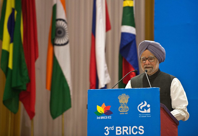 Indian Prime Minister Manmohan Singh delivers a speech during the inauguration of the 3rd BRICS International Competition Conference in New Delhi on November 21, 2013. (AFP Photo / Prakash Singh)