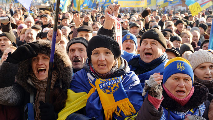 Protesters shout slogans during a rally of the opposition on Independence Square in Kiev on December 22, 2013. (AFP Photo / Genya Savilov)