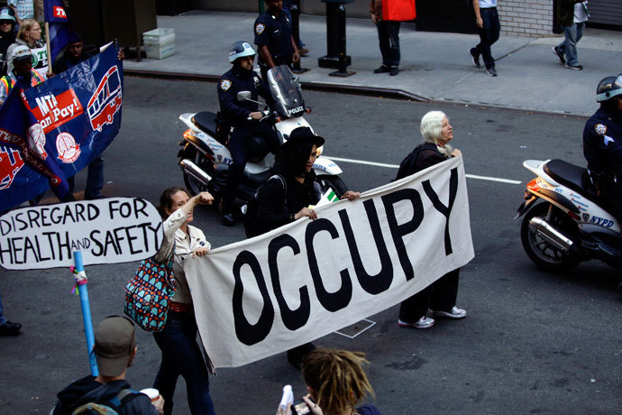Occupy Wall Street protesters march along 47th Street in New York September 17, 2013.(Reuters / Joshua Lott)