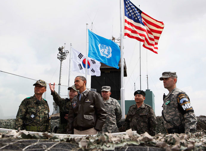 U.S. President Barack Obama visits U.S. military personnel stationed at Observation Post Ouellette along the Demilitarized Zone (DMZ) which borders North and South Korea, outside Seoul, March 25, 2012.(Reuters / Larry Downing)