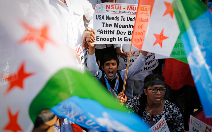 Members of the National Students Union of India (NSUI), the student wing of India's ruling Congress party, shout slogans during a protest in front of the U.S consulate in Mumbai December 20, 2013. (Reuters / Danish Siddiqui)