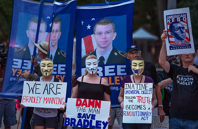 Protesters from a coalition of groups demonstrate the conviction of Wikileaker Bradley Manning late August 21, 2013 in front of the White House in Washington, DC. (AFP Photo / Paul J. Richards)