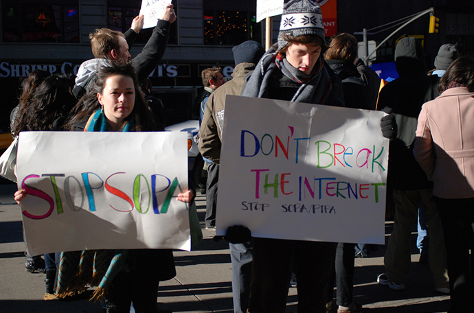 An activists hold a placard during a rally against SOPA, New York. (Photo by Alain-Christian / flickr.com)