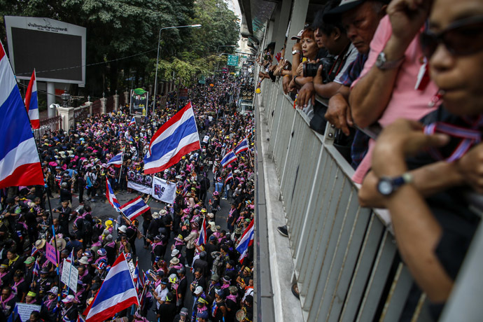 Anti-government protesters gather outside the Royal Thai Police headquarters during a rally in central Bangkok February 26, 2014. (Reuters/Athit Perawongmetha)