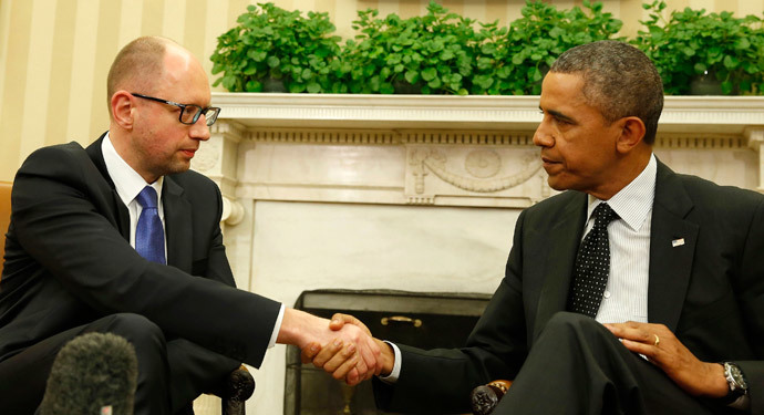 U.S. President Barack Obama shakes hands as he hosts a meeting with Ukraine Prime Minister Arseniy Yatsenyuk (L) in the Oval Office of the White House in Washington, March 12, 2014.(Reuters / Larry Downing)