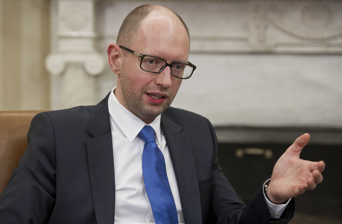 Ukrainian Prime Minister Arseniy Yatsenyuk speaks during meetings with US President Barack Obama in the Oval Office of the White House in Washington, DC, March 12, 2014.(AFP Photo / Saul Loeb)