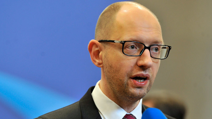 Ukrainian Prime Minister Arseniy Yatsenyuk holds a press conference at the EU headquarters in Brussels on March 21, 2014 on the second day of a two-day European Council summit.(AFP Photo / Georges Gobet)