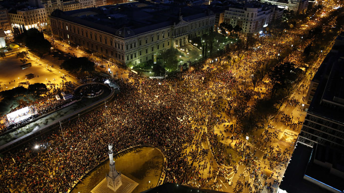 Anti-austerity demonstrators crowd into Colon square as they take part in a demonstration which organisers have labelled the "Marches of Dignity" in Madrid, March 22, 2014. (Reuters)