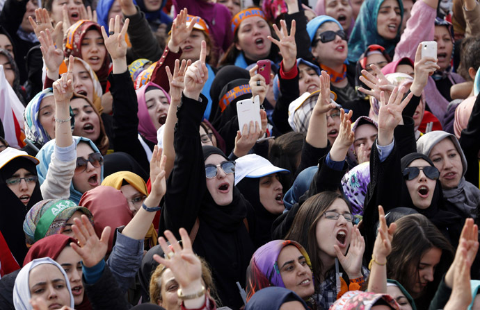 Supporters of Turkey's Prime Minister Tayyip Erdogan cheer during an election rally in Istanbul March 23, 2014. (Reuters)