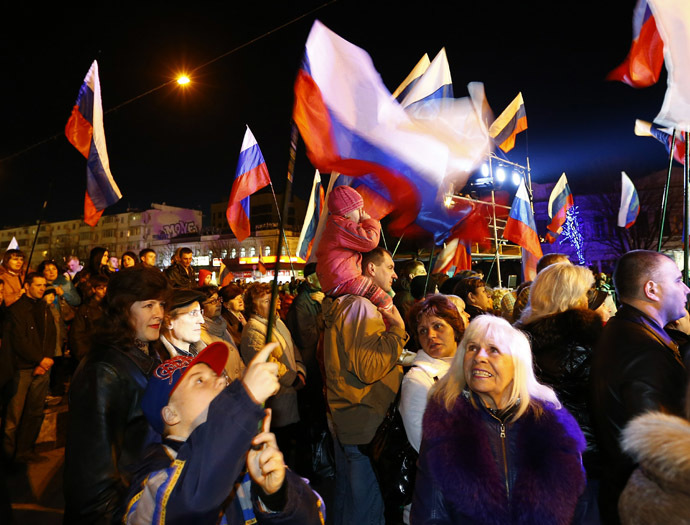 People attend celebrations on the main square of the Crimean city of Simferopol March 21, 2014. (Reuters)