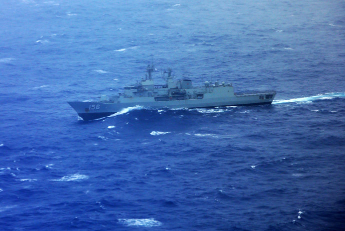 Australian Navy ship HMAS Toowoomba is seen from the Japan Coast Guard Gulfstream V aircraft as it flies over the southern Indian Ocean as they look for debris from missing Malaysian Airlines flight MH370 April 1, 2014. (Reuters)