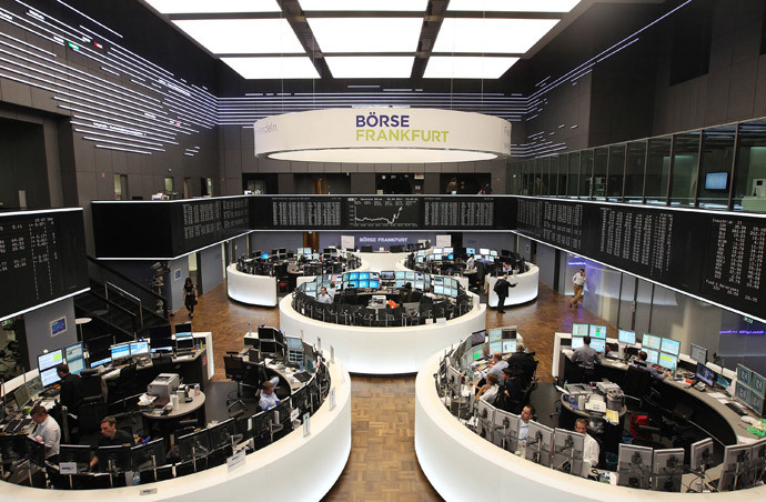 Traders work at the stock exchange in Frankfurt am Main, western Germany (AFP Photo / Daniel Roland)