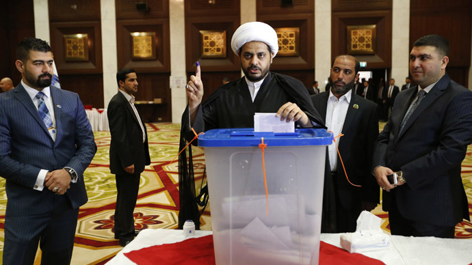 The first post-occupation election in Iraq started with explosions
