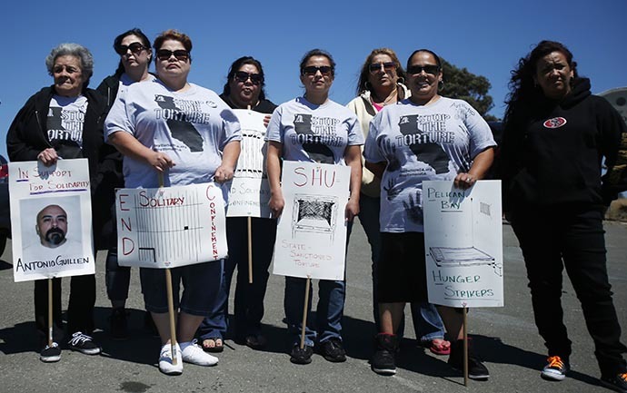 Family members of Pelican Bay inmate Antonio Guillen stand outside San Quentin State Prison in support of inmates who are participating in a state-wide prisoner hunger strike demanding an end to indefinite solitary confinement in California's prison system in San Quentin, August 3, 2013. (Reuters / Stephen Lam)