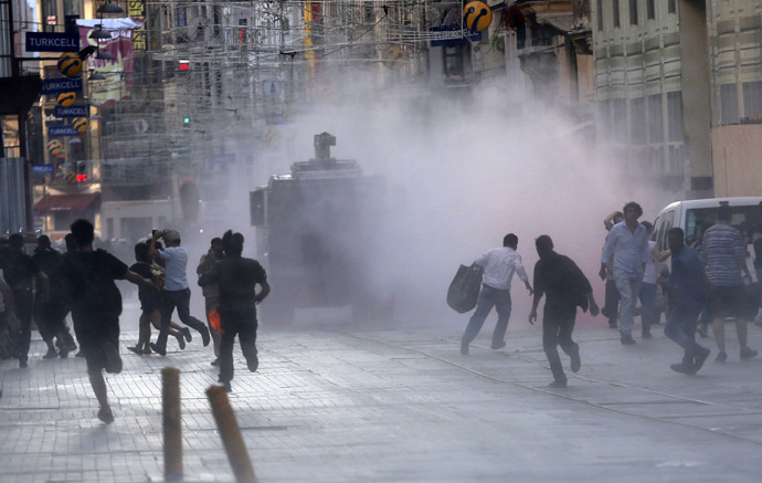 Riot police use a water cannon to disperse protesters in central Istanbul July 8, 2013. (Reuters)