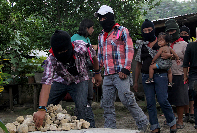 Zapatistas followers take part in the funeral of the teacher and Zapatista leader Jose Luis Solis Lopez in La Realidad, Chiapas State, Mexico (AFP Photo)