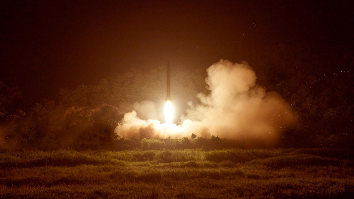 A tactical rocket firing drill carried out by units of the Korean People's Army (KPA) Strategic Force is seen during a visit by North Korean leader Kim Jong Un in the western sector of the front in this undated photo released by North Korea's Korean Central News Agency (KCNA) in Pyongyang on July 10, 2014.(Reuters / KCNA)