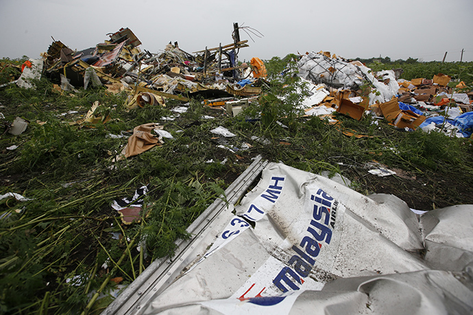 Wreckage from the nose section of a Malaysian Airlines Boeing 777 plane which was downed on Thursday is seen near the village of Rozsypne, in the Donetsk region July 18, 2014. (Reuters / Maxim Zmeyev)