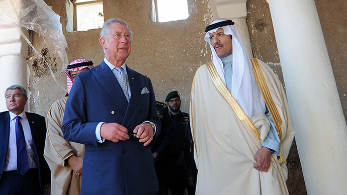 Britain's Prince Charles (C) and Saudi Minister of Tourism, Prince Sultan bin Salman (R) visit a building under renovation in the old city of al-Diriyah on February 19, 2014 on the northwestern outskirts of the Saudi capital, Riyadh. (AFP Photo / Fayez Nureldine)