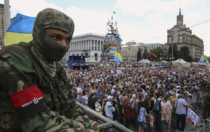 A member of the Ukrainian far-right radical group Right Sector looks on during a protest at Independence Square in Kiev June 29, 2014. (Reuters / Konstantin Grishin)