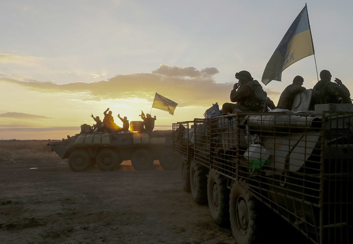 Ukrainian paratroopers ride on armoured vehicles near Debaltseve September 13, 2014. (Reuters/Gleb Garanich)