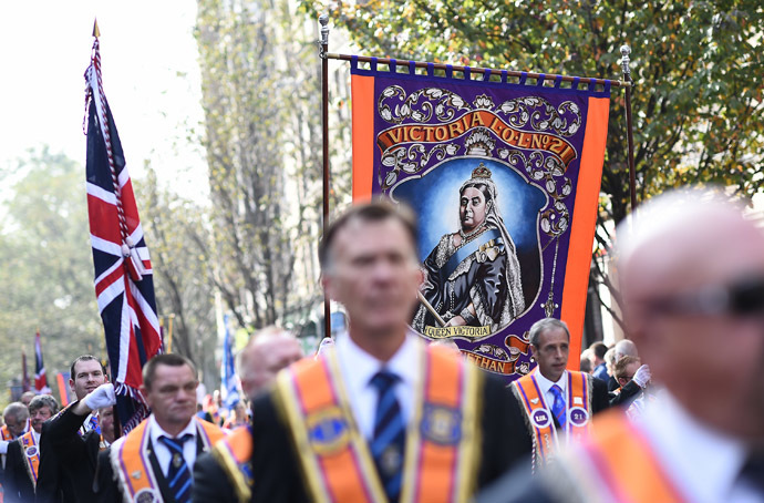 Members of the Orange Order march with a banner showing Queen Victoria during a pro-Union rally in Edinburgh, Scotland September 13, 2014. (Reuters/Dylan Martinez)