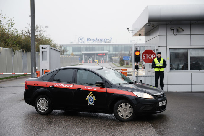 A car of the Investigative Committee of the Russian Federation at Moscow's Vnukovo airport near site where a single-engined Falcon aircraft has crashed, killing four people, including President of the French energy company Total Christophe de Margerie. (RIA Novosti / Maksim Blinov) 