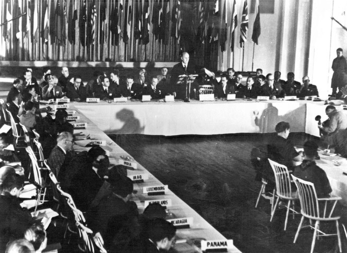 A picture from the US National Archives released by the International Monetary Fund show U.S. Secretary of the Treasury Henry Morgenthau addressing the opening meeting of the Bretton Woods Conference â sitting at the table where Morgenthau is speaking (from L): Rene Ballivian (Bolivia); Leslie G. Melville (Australia); two unidentified individuals; Morgenthau; Frank Coe (United States); and Camille Gutt (Belgium). (AFP Photo)